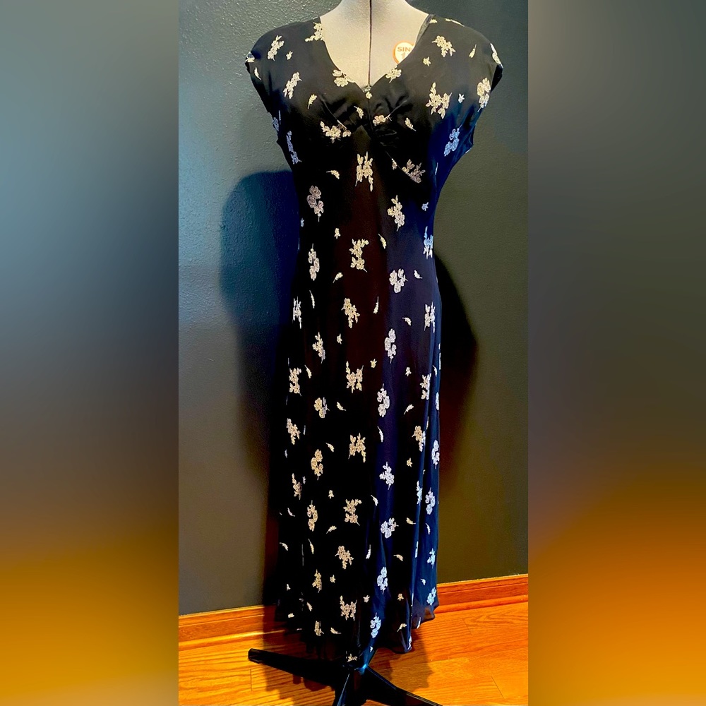 Ladies dress by Jones Wear Dress, size 14, black with cream color design.